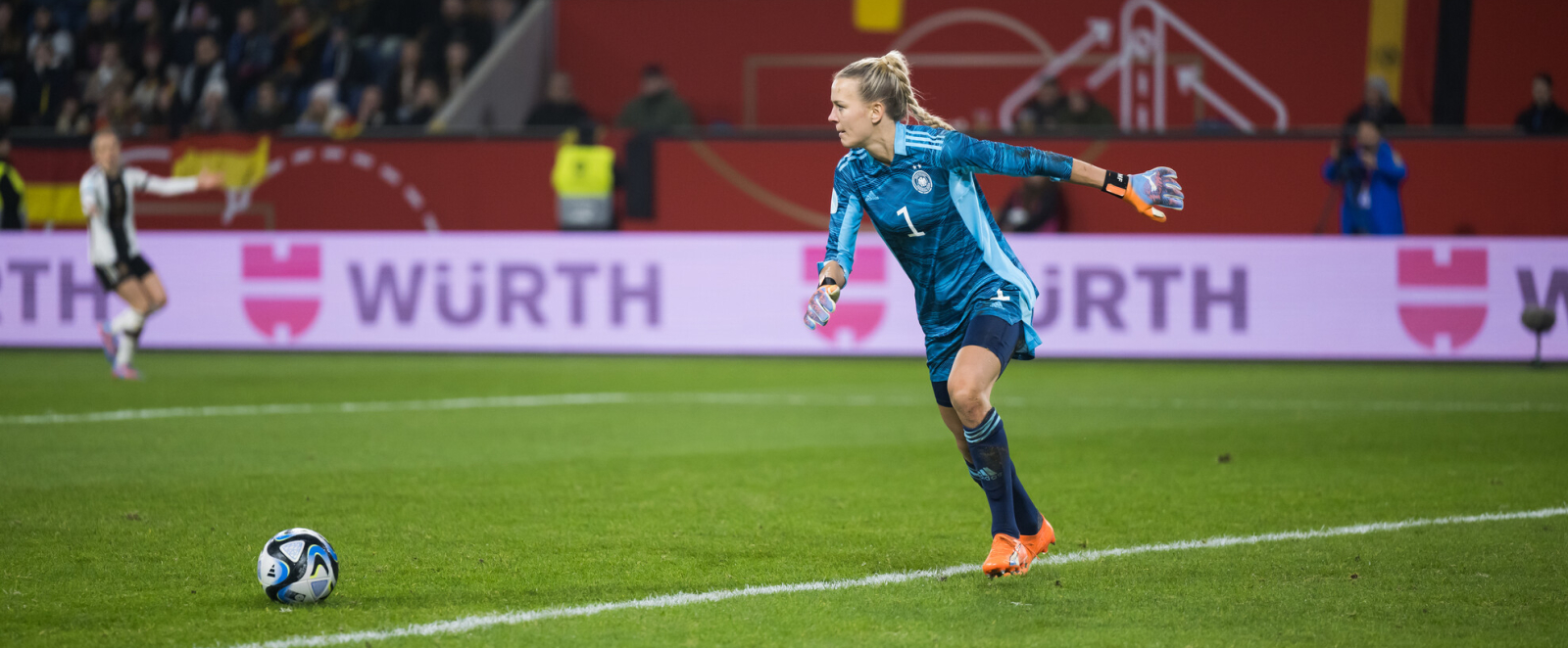 Spielerin auf dem Rasen